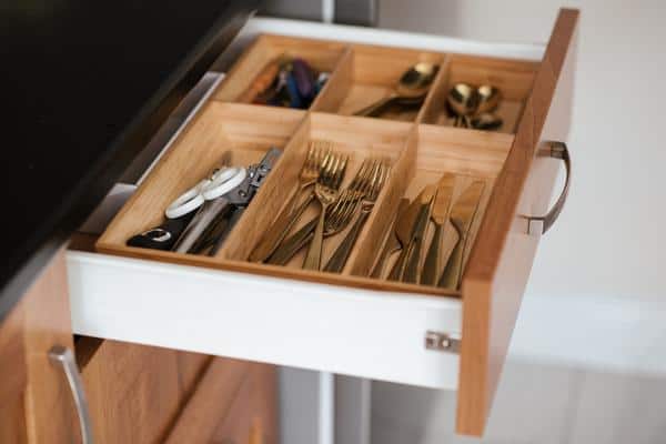 7 Genius Kitchen Organization Ideas You Can Copy From Commercial Kitchens: Store utensils, kitchenware